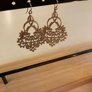 gold ornamental dangle earrings